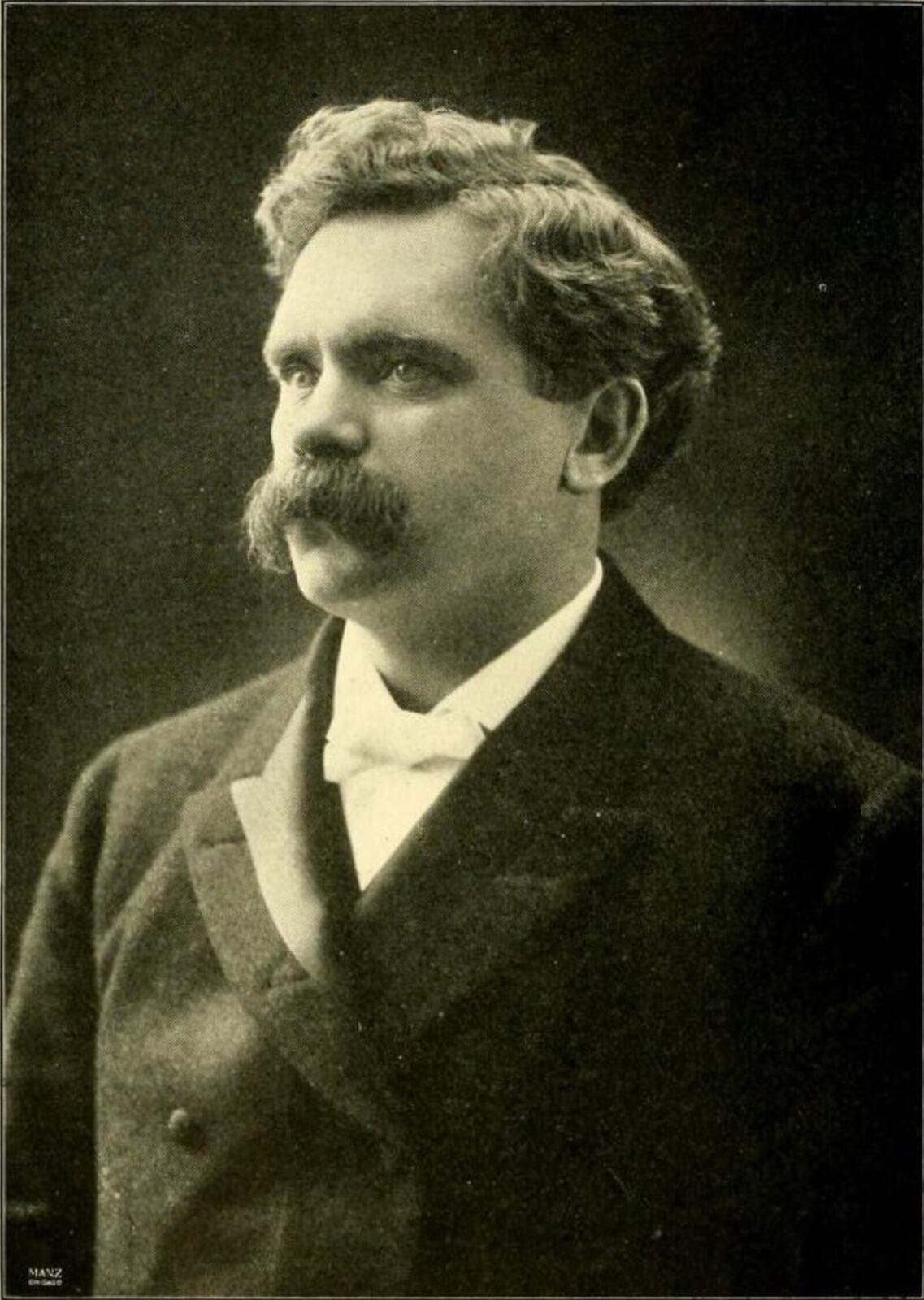 Black-and-white portrait of B. H. Roberts as a young man